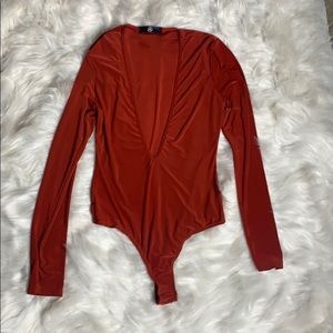 Rust Orange plunge bodysuit